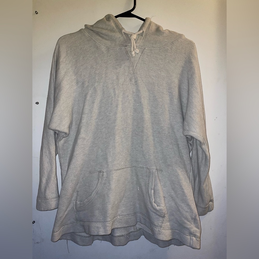 Distressed hoodie. Looks grey but is white.